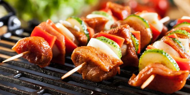 meat and cucumber shish kebabs on the grill