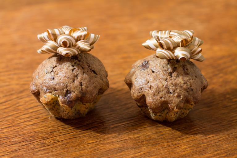 Two date and walnut muffins