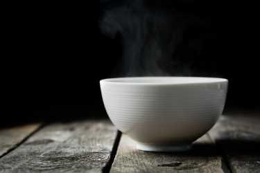 A bowl of steaming bone broth.